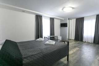 Отель Motel Sun Lit Ивано-Франковск Стандартный номер с кроватью размера "king-size"-8